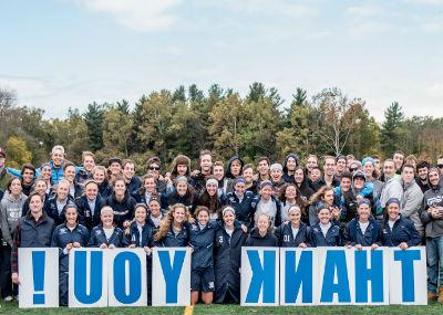 Women's sports team with Thank You sign.